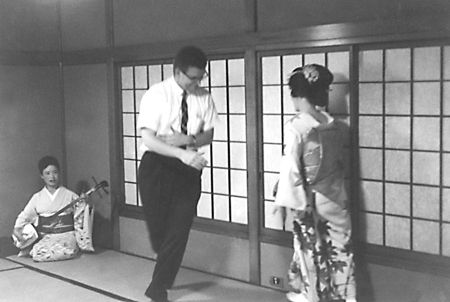 Dad dancing with Geishas